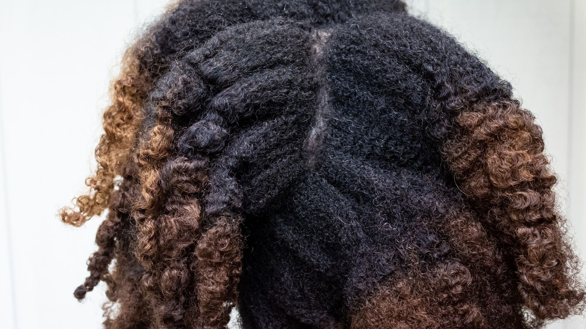 How to care for dyed or chemically-treated afros and curls in winter